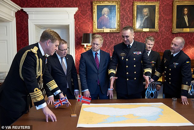 British Defense Secretary Grant Shapps meets Norwegian Defense Minister Bjorn Arild Gram and Ukrainian Navy Commander Oleksiy Neizhpapa (third from right)