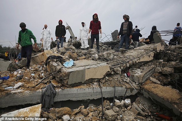 Search and rescue operations continue in the area in the town of Az Zawayda, Deir Al Balah, Gaza, following an Israeli airstrike on January 29, 2024