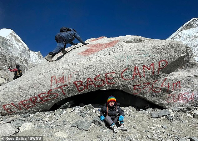 He completed the journey on the back of dad Ross, with mum Jade, 31, beside him