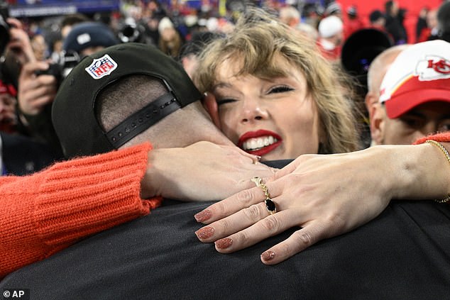 Swift looked elated after the public display of affection on the field in Baltimore on Sunday