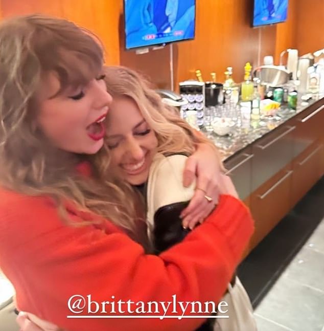 Taylor shares a hug in the VIP suites with her new best friend, Patrick Mahomes' wife Brittany