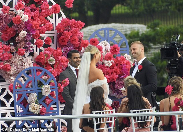 Tim and Sara read their vows three times, with each shot recorded from a different angle