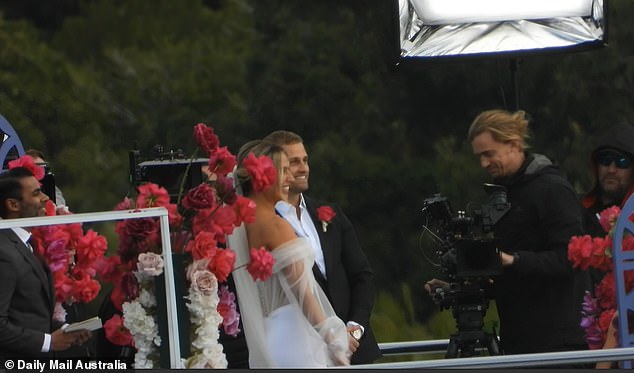 After filming the scene, the newlyweds looked around to see if the producers were happy with the footage