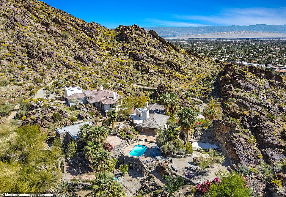 A rugged desert view surrounds the estate's undisturbed living space