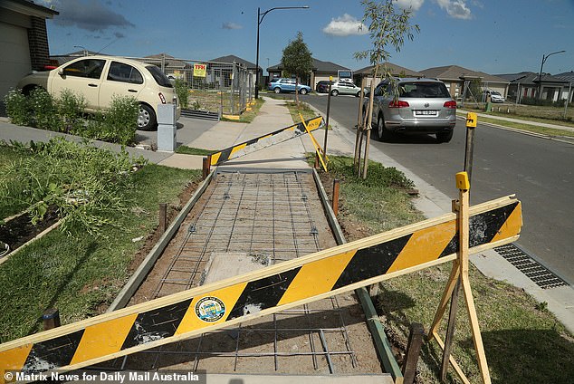 The sinking has caused large cracks in houses, driveways and footpaths on the estate