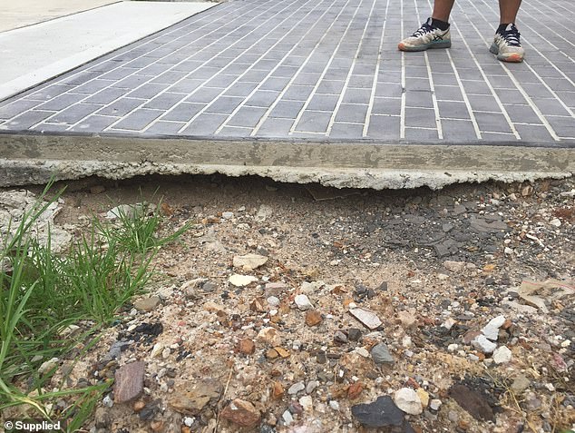 The ground sank so much to expose the bottom of the driveway of this house that the Daily Mail visited in 2020