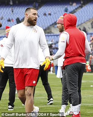 Travis Kelce looks at Justin Tucker