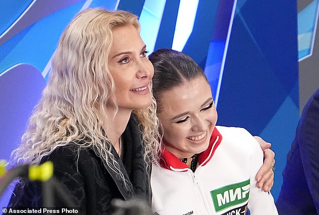 FILE - Russian Kamila Valieva, center, and her coach Eteri Tutberidze, left, react after participating in the women's free skating program during the figure skating competition during the 2023 Russian Grand Prix Figure Skating in Moscow, Russia, Sunday, November 26, 2023 Russian figure skater Kamila Valieva has been disqualified from the 2022 Olympic Games in Beijing.  The ruling by the Court of Arbitration for Sport comes almost two years after Valieva's doping case caused unrest at the Beijing Games.  (AP Photo/Alexander Zemlianichenko, file)