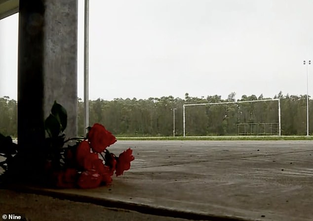 Red flowers (pictured) have been laid at the club in tribute to the toddler who died on Sunday