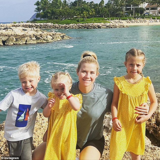 Elizabeth (pictured with her three children in 2022) said she encourages parents to practice shouting with their children as it can alert those around them if they are in danger