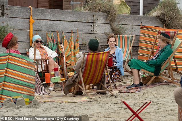 The cast of Call The Midwife chatting before a scene