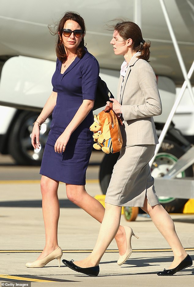 Former Private Secretary to the Duchess of Cambridge Rebecca Deacon and nanny Maria Borrallo arrive at Sydney Airport on April 16, 2014