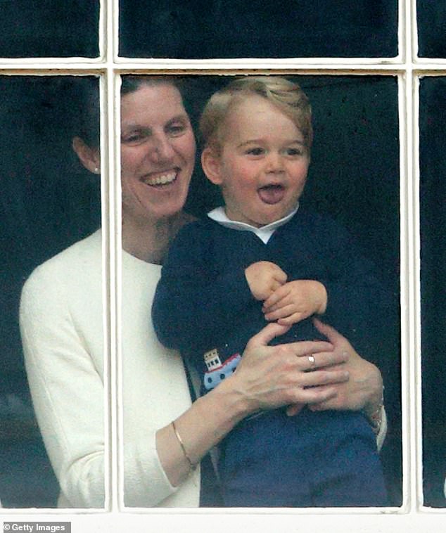 Prince George is held up at a Buckingham Palace window by his nanny Maria Teresa Turrion Borrallo to watch Trooping the Color on June 13, 2015