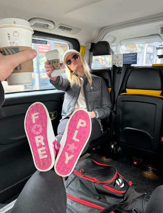 Nadiya also posed in her pink sneakers and rested on Kai's lap as they ventured around town with their morning coffee in hand