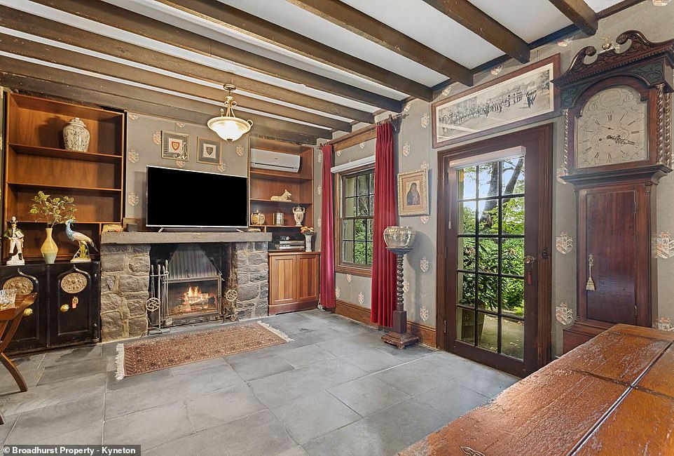 Stepping through the blue front door of the main house is like traveling back in time with exposed cobbled stone walls, original fireplaces, vaulted ceilings and period furnishings