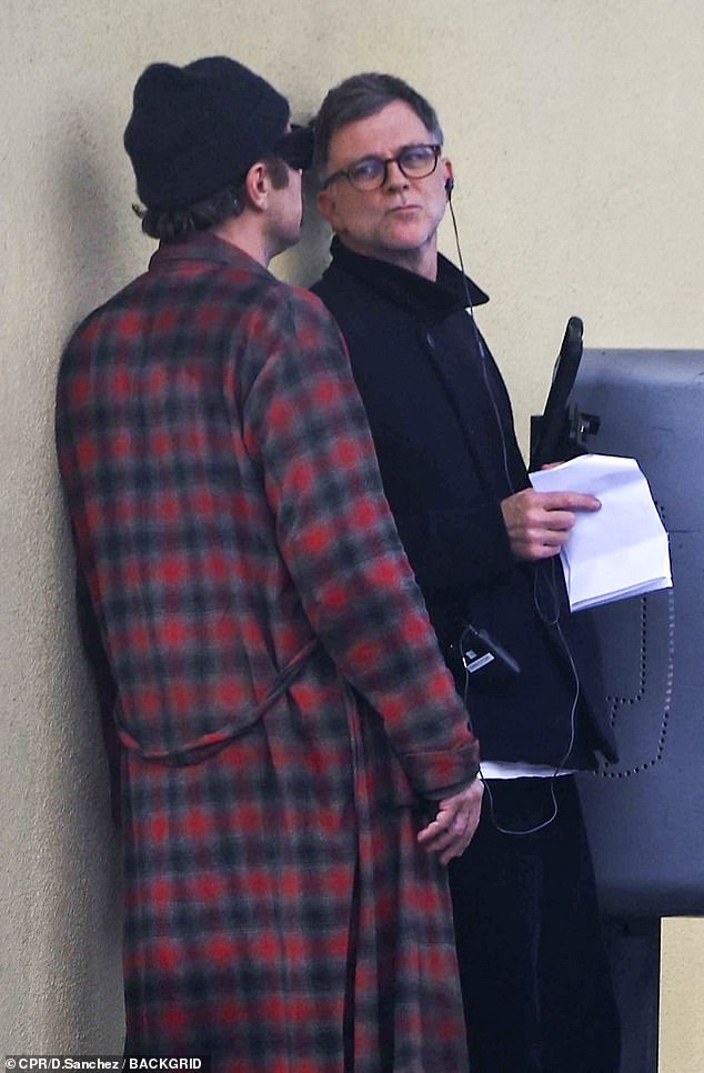 He was seen talking to director Anderson