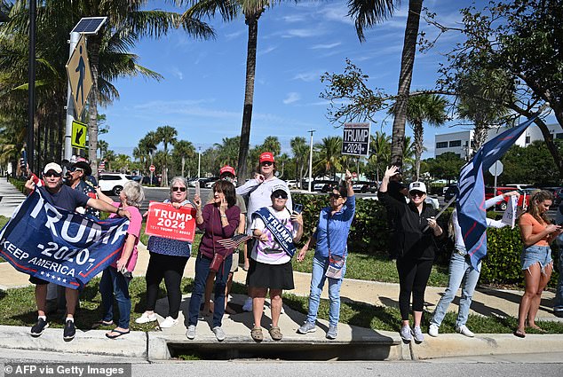 Trump supporters lined up as the president's motorcade made its way from West Palm Beach airport to Jupiter, Florida, for a fundraising campaign