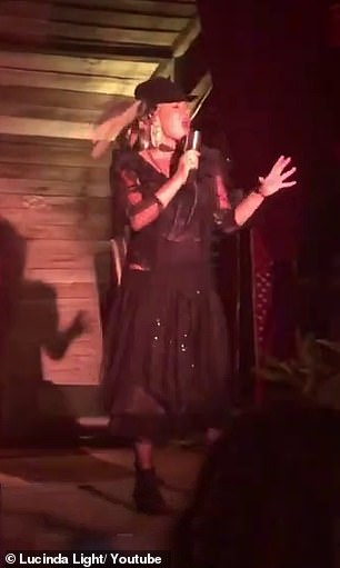 Videos of her performances show Lucinda storming the stage in flapper-inspired clothing and a feathered hat