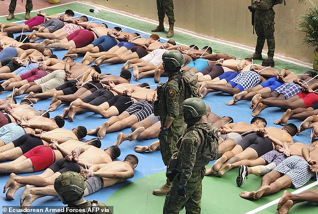 Prisoners were forced to lie on the ground in a courtyard of the Regional 8 prison complex during an operation in Guayaquil, Ecuador, on January 18. At least 31,321 men and women are being held in 36 prisons.