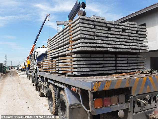 The truck driver delivered a load of 10 tonnes of concrete slabs to the site (stock image)