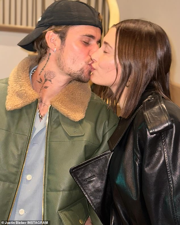 In one shot, he plants a kiss on his wife of five years as he stands at the entrance of their $26 million home