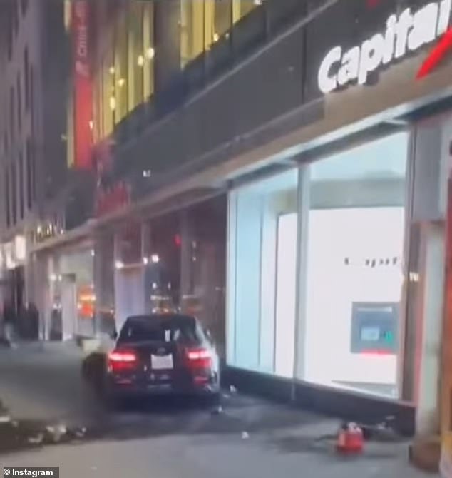 Video shows the Mercedes backing into a barrier, then hitting a halal cart and continuing to the sidewalk