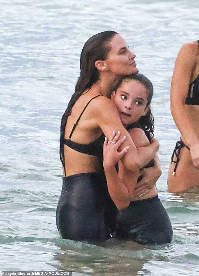 Jodi was seen giving Aleeia a loving hug in the sea before she started sweating as she ran across the sand