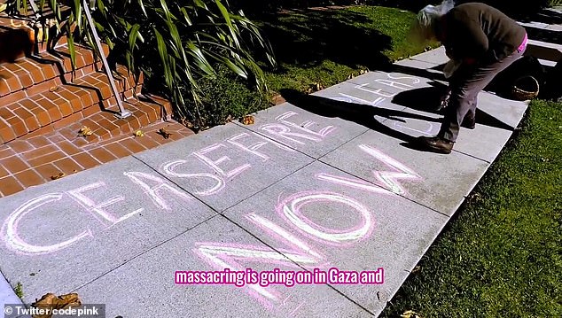 The group had also chalked “truce, please Pelosi” on the sidewalk in front of her home