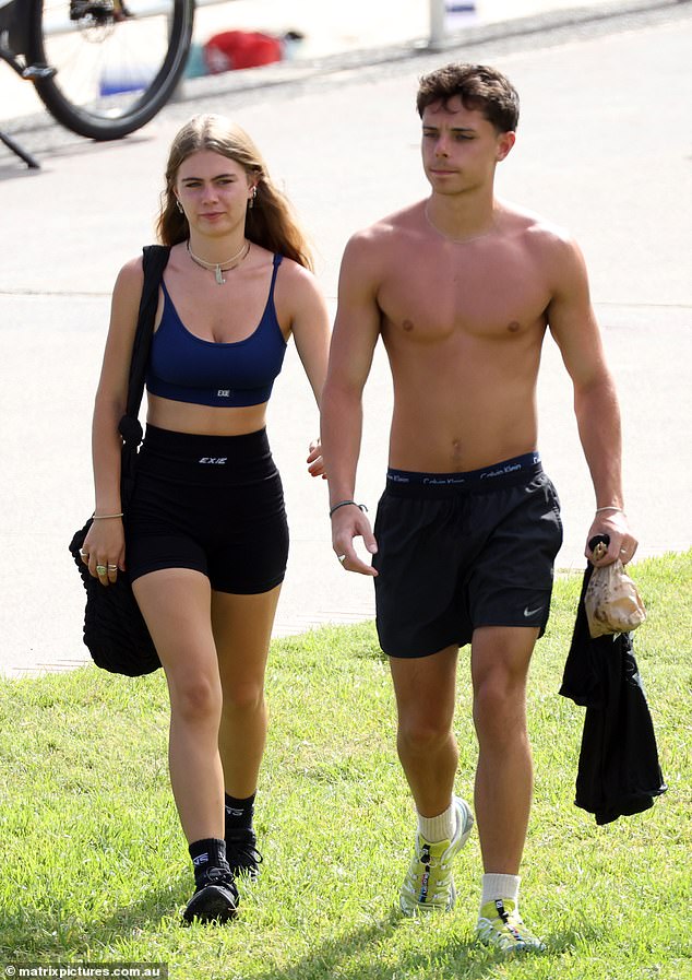 Mia embraced sportswear for the occasion and wore a blue sports top and black cycling shorts