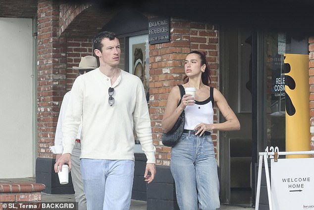 1706690337 296 Dua Lipa packs on the PDA with her new boyfriend