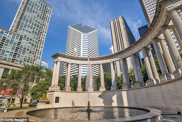 The diamond-shaped building is split in the middle and has a crack at the top.  When illuminated at night, the outline resembles female genitalia