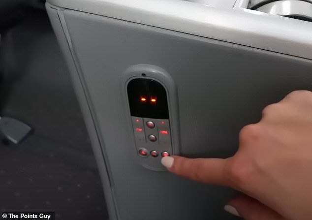 Maz demonstrates some premium economy seat buttons on Norse