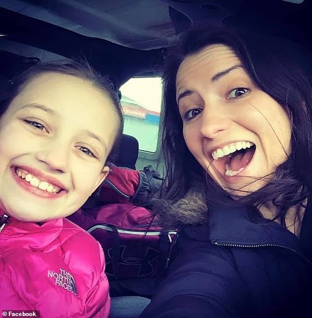 Holland's four daughters from a previous relationship were reportedly afraid of Daus and witnessed numerous violent scenes between him and their mother.  Holland is pictured with her daughter Emma