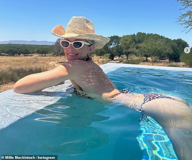 The former reality star wowed in a leopard print two-piece paired with a straw hat and sunglasses while swimming in a pool