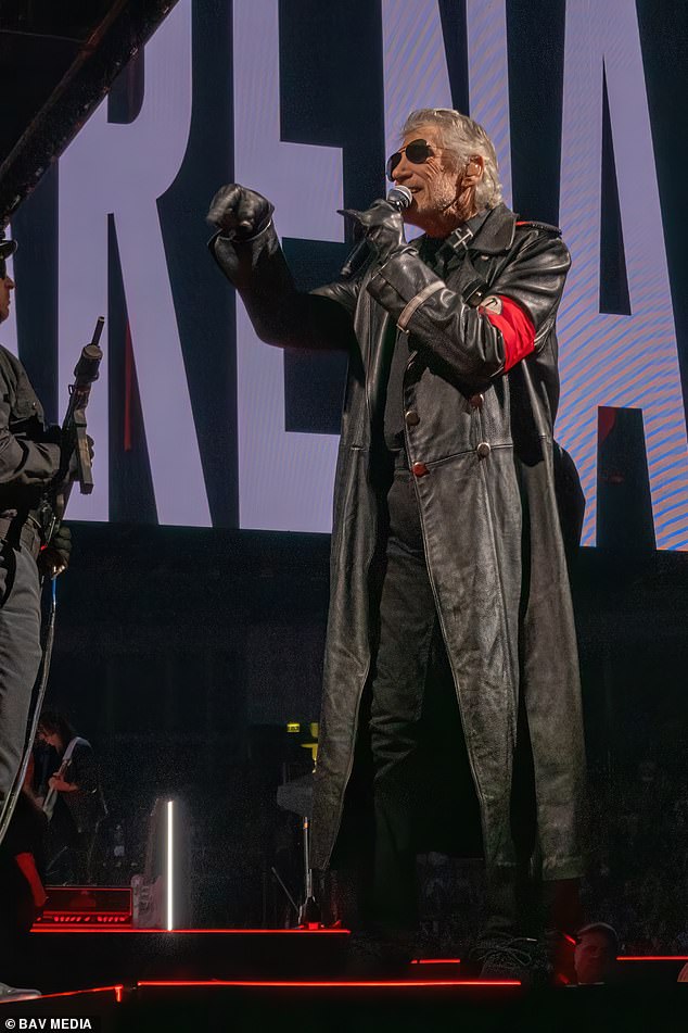 Pictured: Roger Waters wearing a long black leather jacket with a Nazi-style armband during a concert at London's O2 Arena in June this year