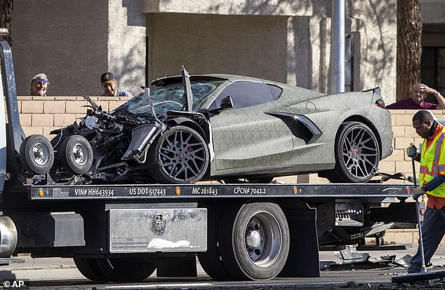 A Chevrolet Corvette owned by then-Raiders wide receiver Ruggs III is shown on a flatbed truck after a fatal crash on South Rainbow Boulevard on November 2, 2021