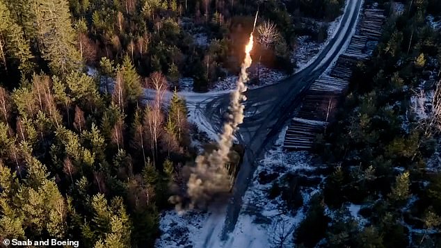 A CGI rendering also shows the rockets in use, with trucks rolling over a bridge