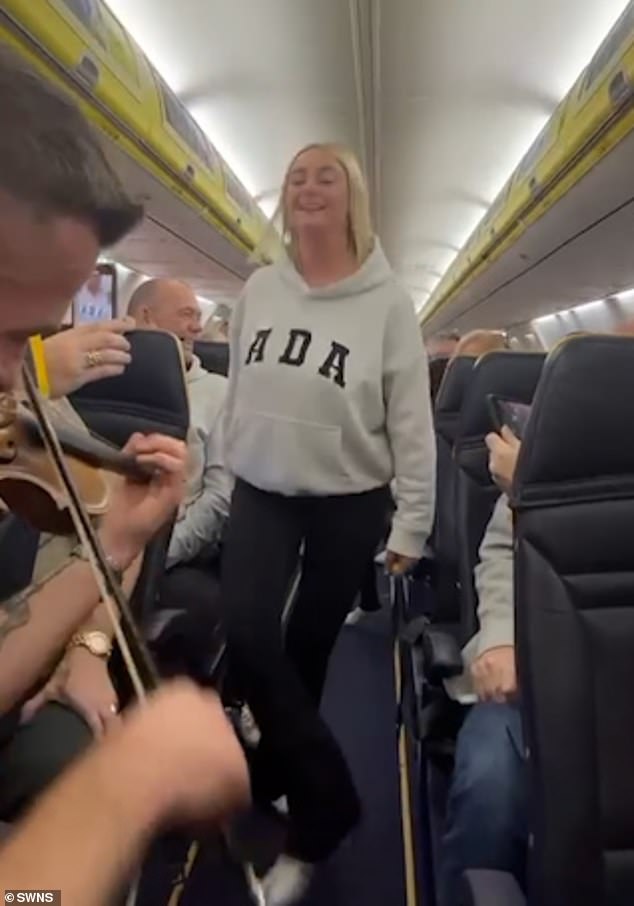 A female passenger suddenly stood up and started doing a Riverdance, creating a fun atmosphere on the plane