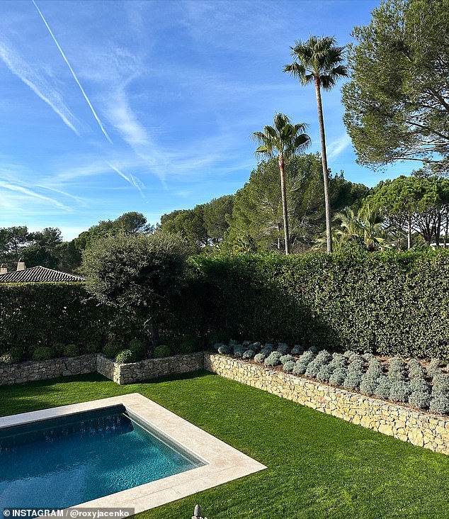 The bombshell also posted a photo of a spacious backyard with a large swimming pool and revealed she was on the hunt for a holiday home in Paris