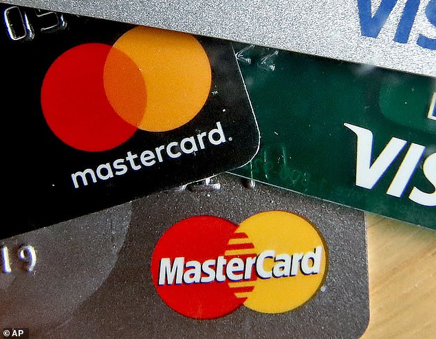 Nearly half of Americans will be in credit card debt overnight — and the majority for at least a year — as the legacy of high inflation takes its toll