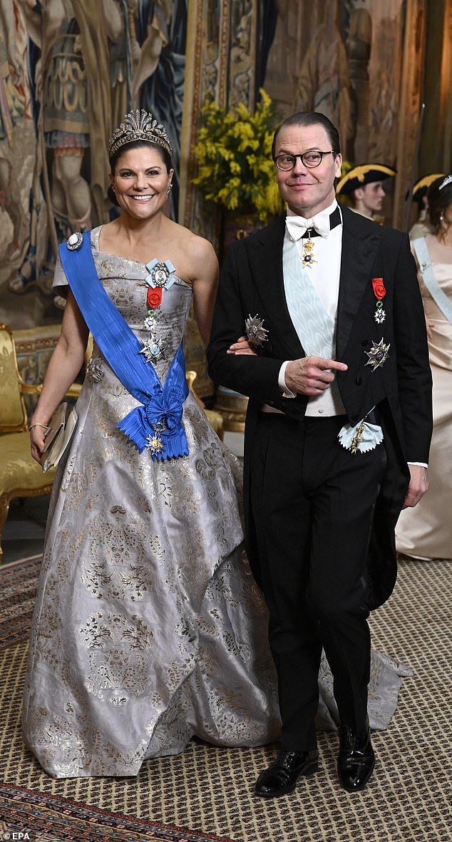 Stockholm was awash in glitz and glamor tonight as the Swedish royal family hosted a gala dinner for President Macron and his wife Brigitte.  In the photo: Crown Princess Victoria and Prince Daniel