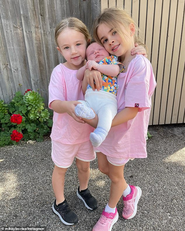 Another photo showed Murphy's sisters holding her