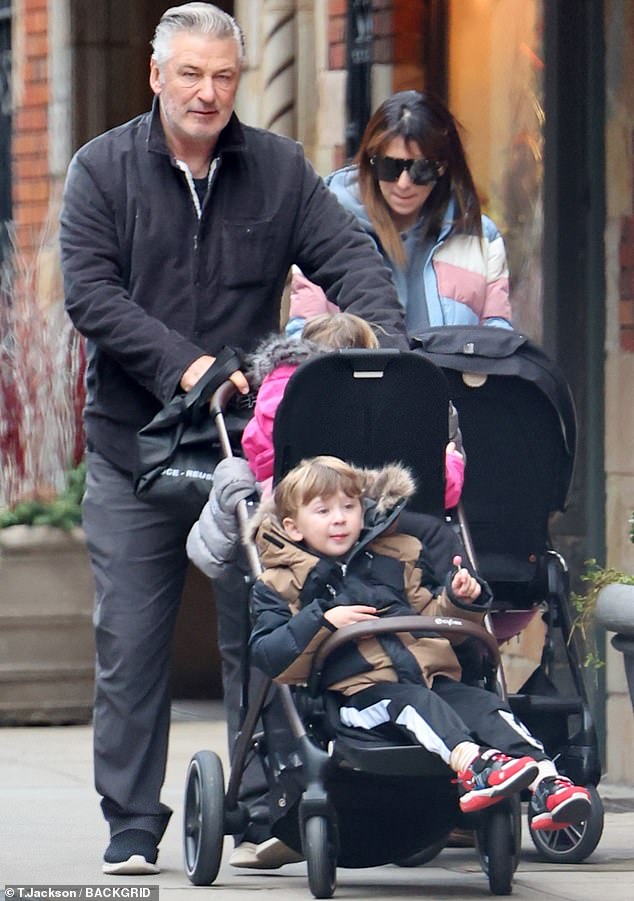 Alec Baldwin, 65, popped up for a chilly walk in New York City on Wednesday with his wife Hilaria, 39, and three of their children