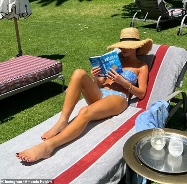 Amanda Holden swapped the cold English climate for glorious sunshine as she worked on an exciting new project abroad on Friday