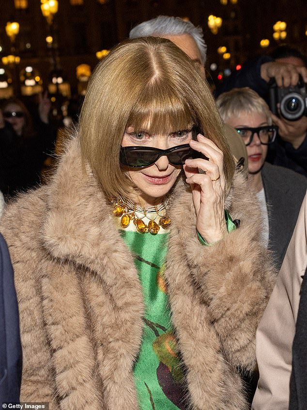 Anna Wintour embraced the mafia wife trend as she stepped out with film director Baz Luhrmann for Haute Couture Week in Paris on Monday