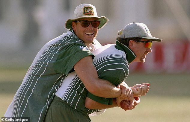 May's battle with cancer follows a recent interview in which he admitted he was previously an alcoholic (pictured with Shane Warne)