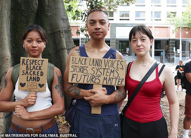 Marco Mannering (pictured centre) called on non-Indigenous Australians to 'wake up' and 'ask questions' about the meaning of January 26 for First Nations people