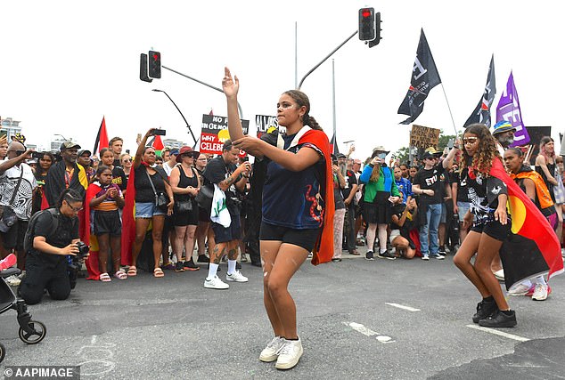 Human rights organization Amnesty International advises against calling someone an Aboriginal, even if they are Aboriginal.  Protesters are pictured at an Invasion Day rally in Brisbane on Friday