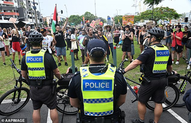 Groups flying Palestinian and Aboriginal flags had gathered outside the stadium on Friday, with police making at least two arrests 90 minutes before day two was due to start.