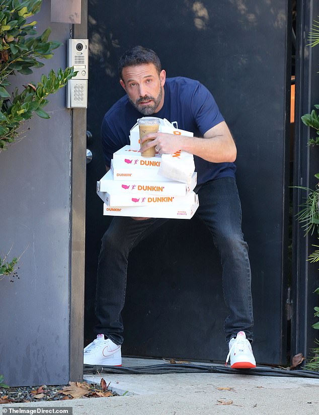 The 51-year-old actor was spotted dropping several boxes of donuts and cups of coffee as he filmed the spot